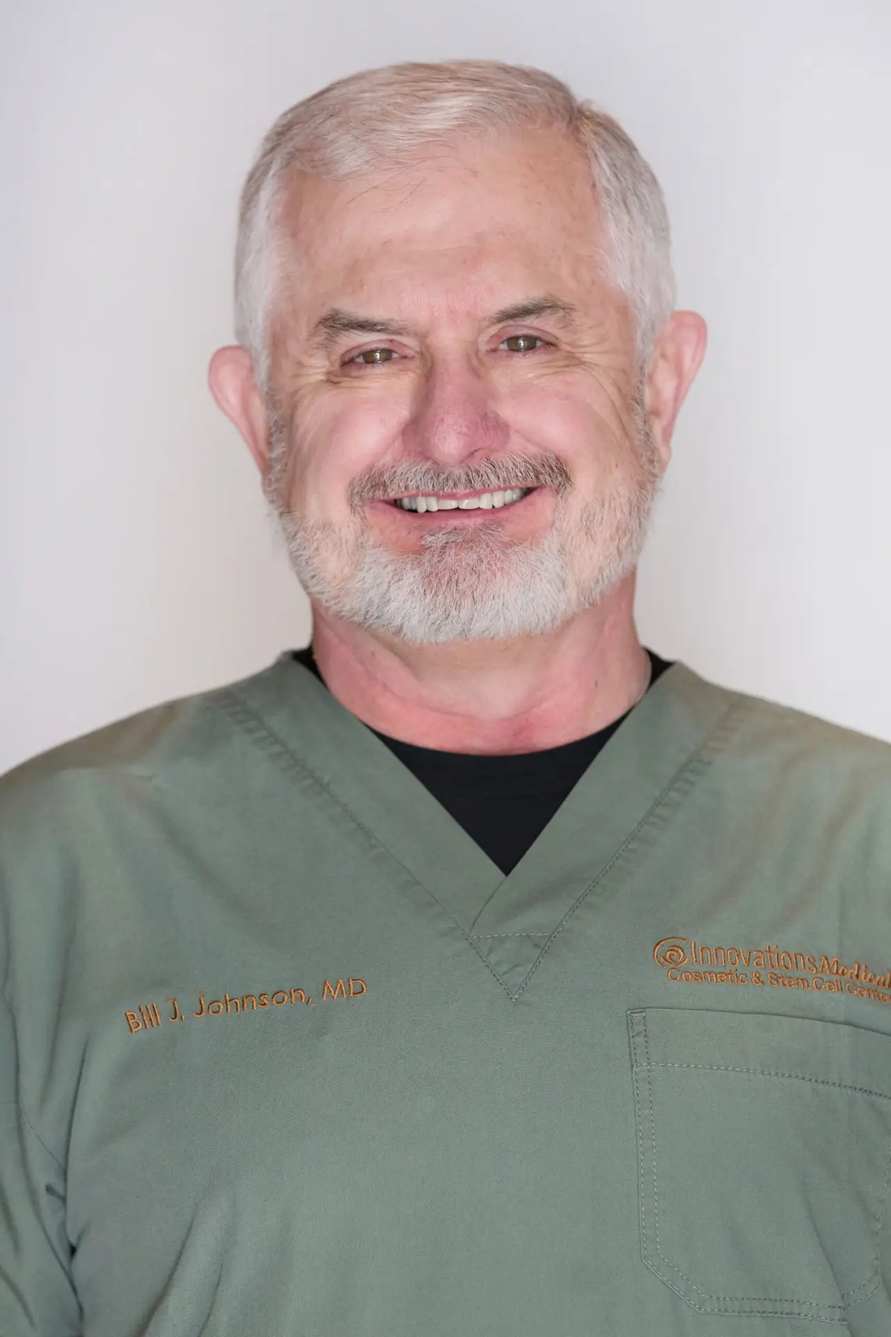 dr bill Johnson in green scrubs, innovations medical dallas